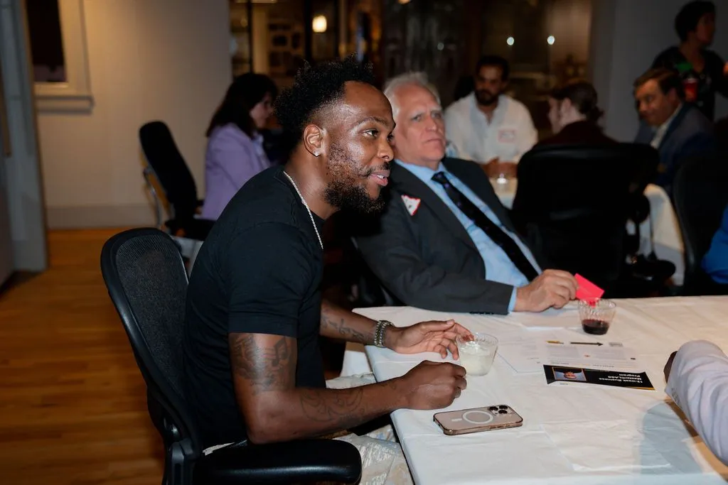 Attendees engaged in a seminar discussion