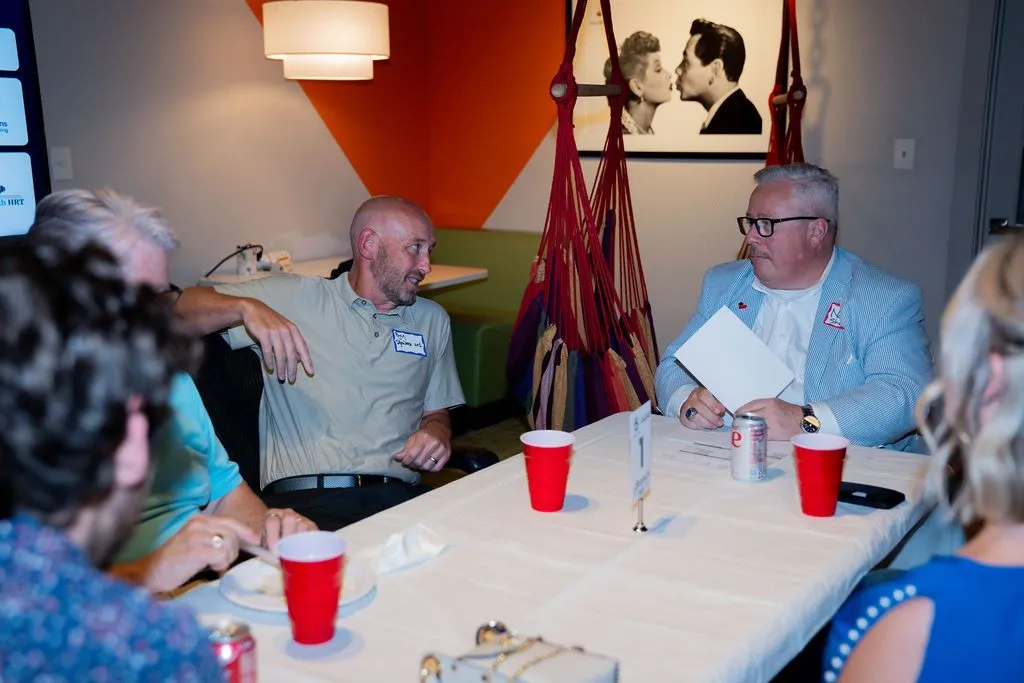 People sharing conversation at a relaxed networking brunch